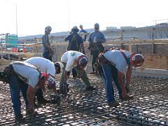 Construction site where reinforced steel is fixed with an automatic rebar tier